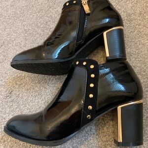 Elegant Black Patent Heeled Boots with Gold Studs